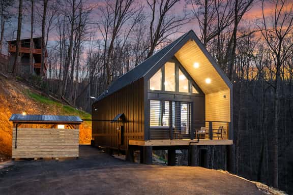 Sleek A-frame cabin with deck, hot tub pavilion & forest views