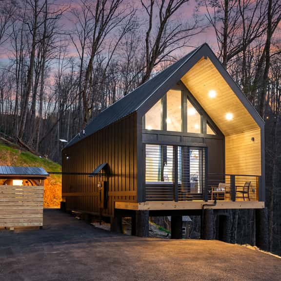 Sleek A-frame cabin with deck, hot tub pavilion & forest views